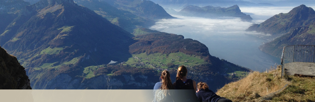 Students looking out over mountains and water